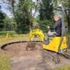 Trampoline Installation -Digger (3) Trampoline Ingraaf Service Flat to the ground